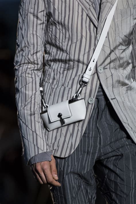 zegna leather purses.